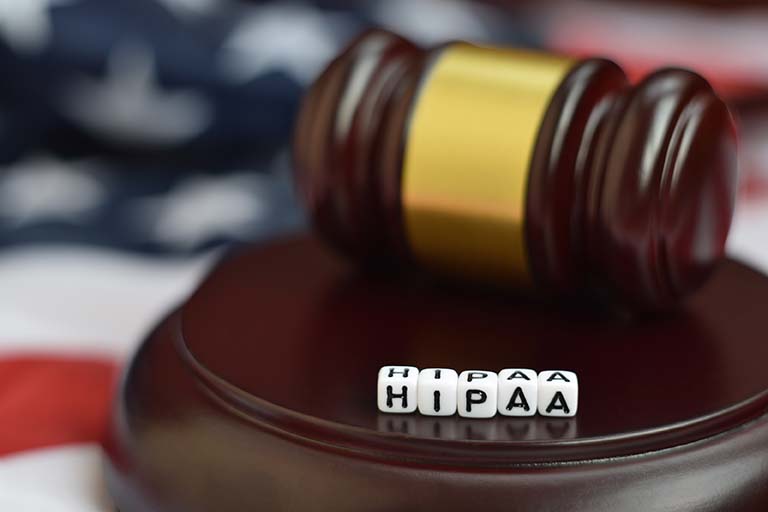 justice mallet and hipaa acronym. health insurance portability and accountability act